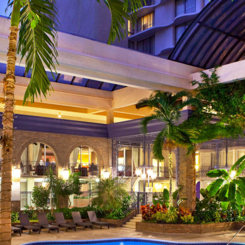 sheatlxspo-179722-pool-at-dusk-high_1800x787